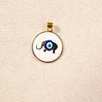 Dije Elefante con Ojo Turco Oro Laminado 18K